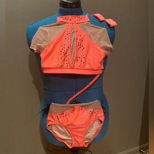 One piece Patrick J dance costume. Orange and nude with black feathers. size CL.